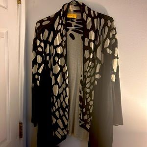 This is very nice blazer designed by ST John size medium